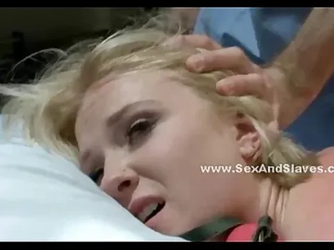 A hot blonde girl is at the mercy of her master wearing a collar