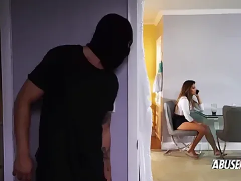 A young girl was on the phone when a burglar broke in.