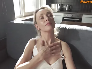 Horny blonde stepmom seduced her stepson wearing sexy tan pantyhose.