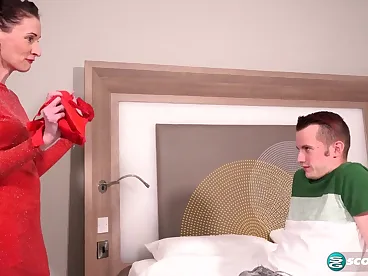 A mature Scarlet has sex with her step-son, exploring forbidden desires in a