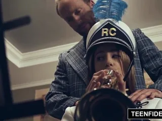 Cute girl Kristen Scott blows cock with the passion of a trumpet player.