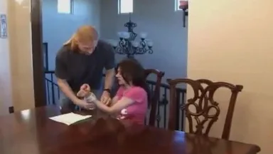 A BDSM scene with a slut tied up and gagged while being